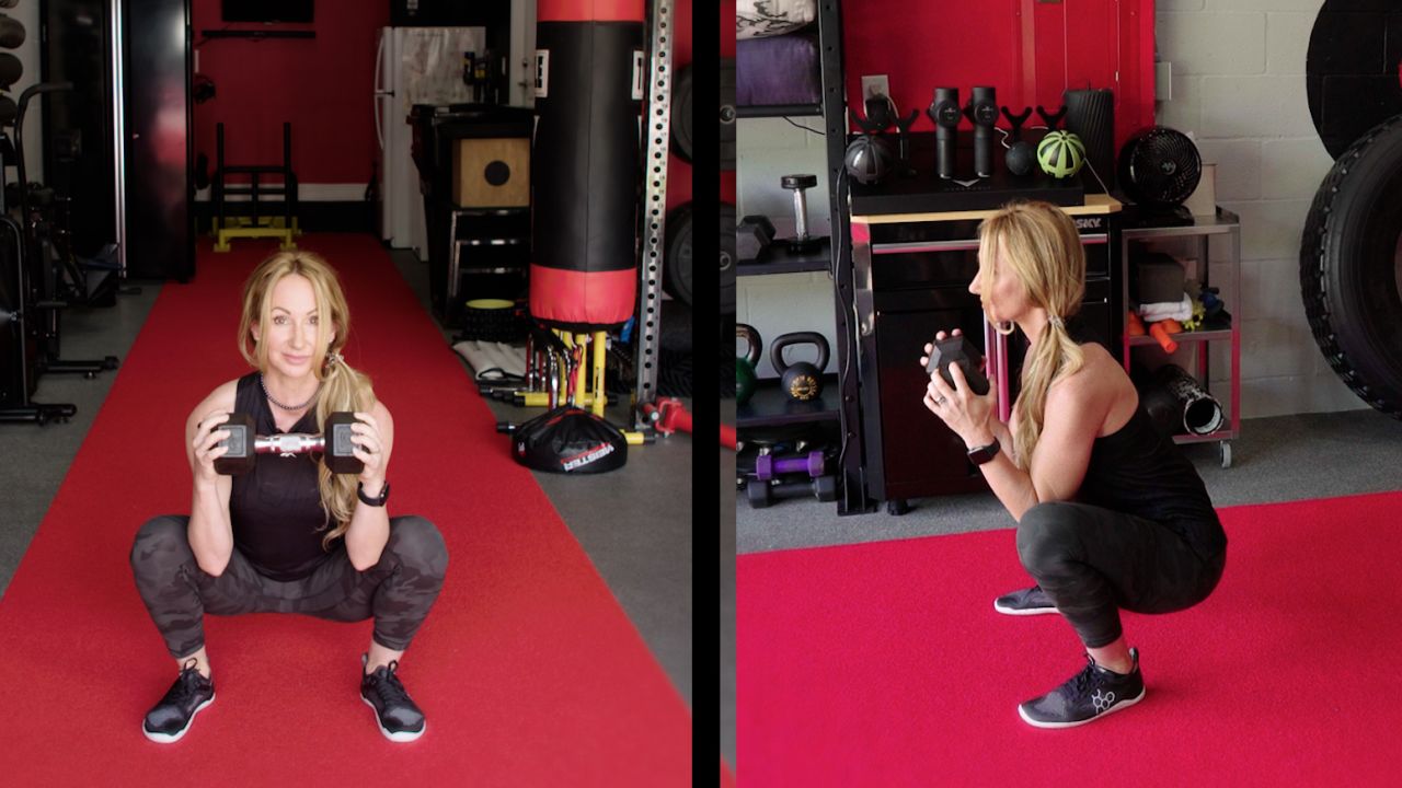 Angle your feet out slightly to open your hips at an angle that's comfortable for you to squat.