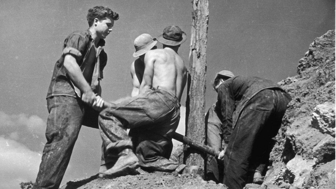 Boys at work at a Civilian Conservation Corps (CCC) camp at the Beltsville Agricultural Research Center, Maryland, circa 1935. The CCC was a public work relief program for unemployed men, providing vocational training through the performance of useful work related to conservation and development of natural resources in the US from 1933 to 1942. 