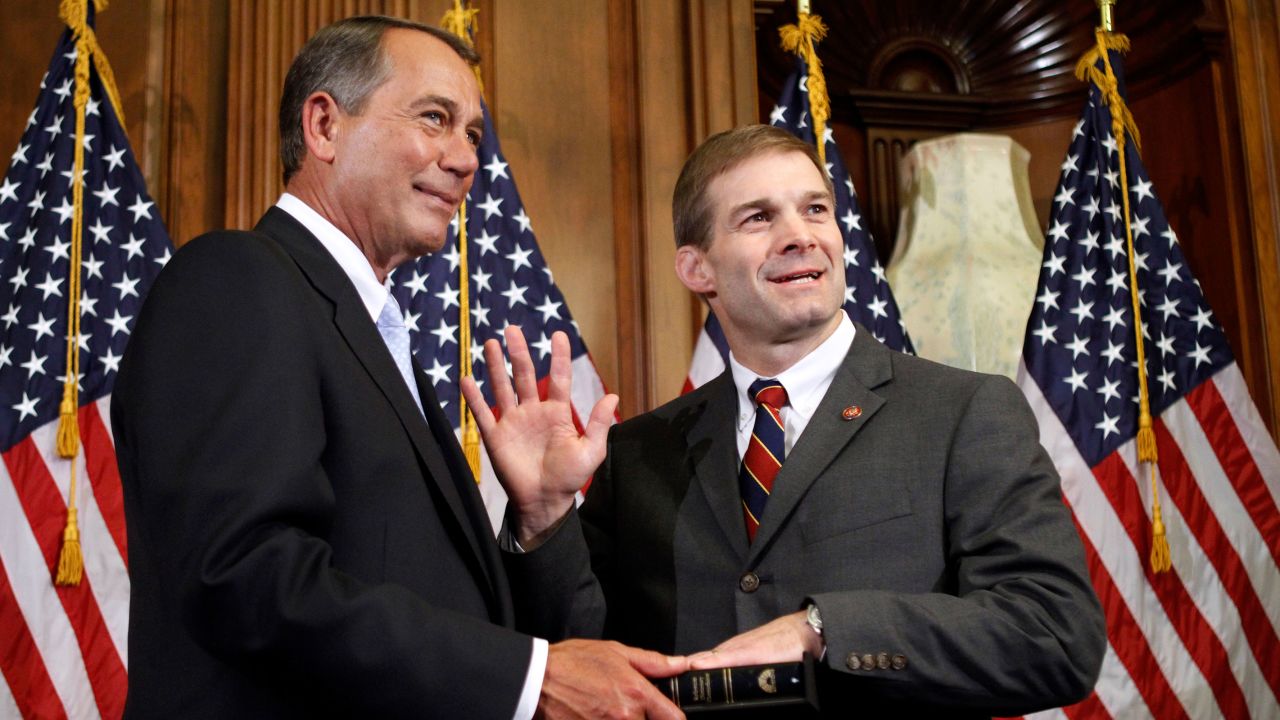 House Speaker John Boehner of Ohio participates in a ceremonial swearing in with Rep. Jim Jordan on Capitol Hill in 2011.