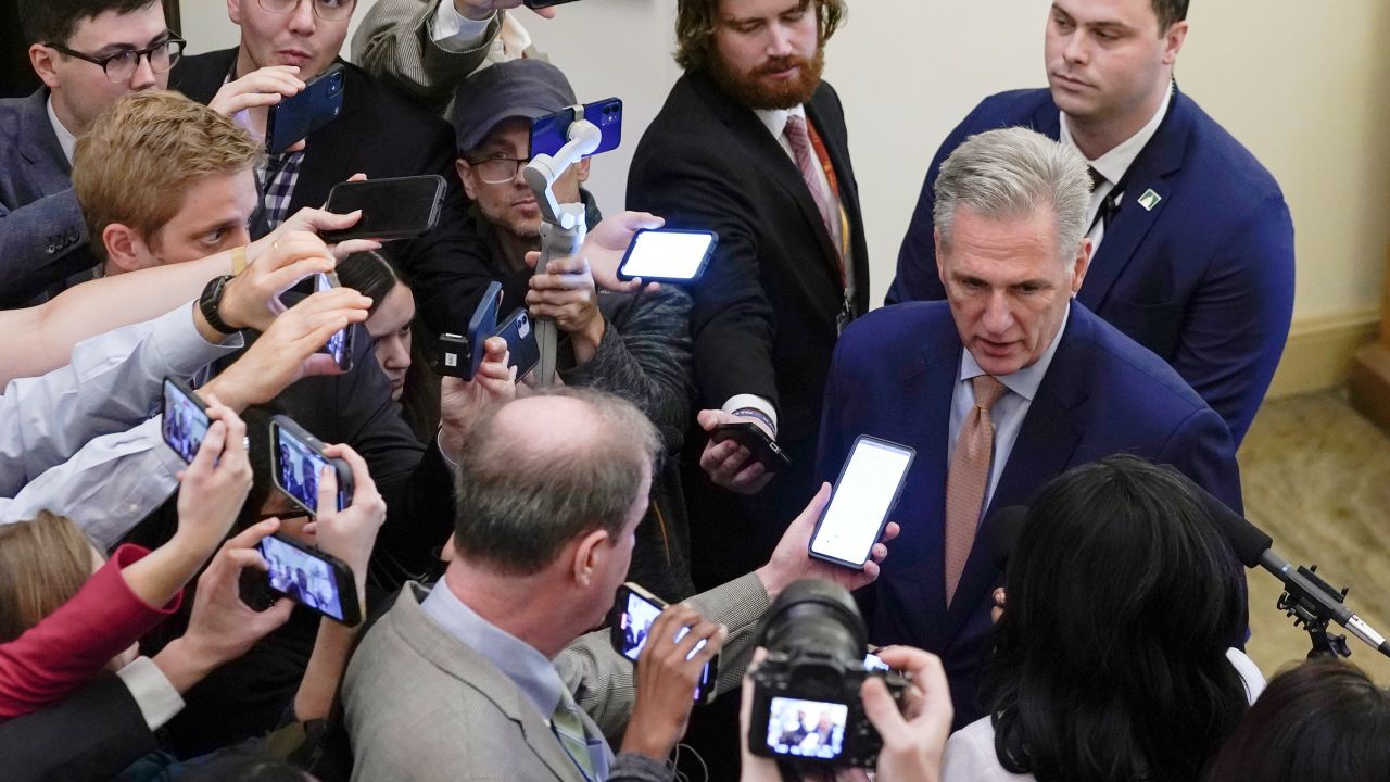 Former House Speaker Kevin McCarthy talks with reporters at the Capitol on October 12, 2023.