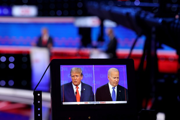 U.S. President Joe Biden (R) and Republican presidential candidate, former U.S. President Donald Trump participate in the CNN Presidential Debate at the CNN Studios on June 27, 2024 in Atlanta, Georgia. (Photo by Justin Sullivan/Getty Images)