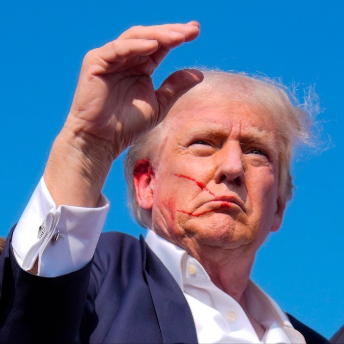 Donald Trump with blood on his face after the shooting 