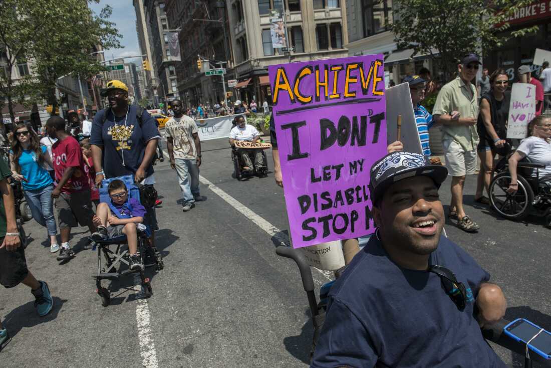 People participate in the first annual Disability Pride Parade on July 12, 2015 in New York City.